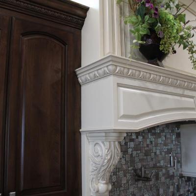Custom kitchen hood with details and corbels. 