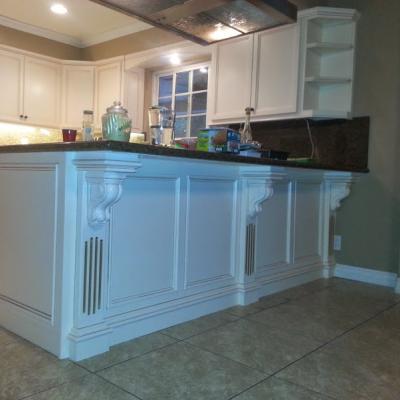 custom kitchen cabinets with corbels